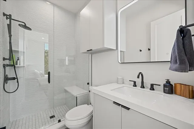 a bed room with a bed and a window