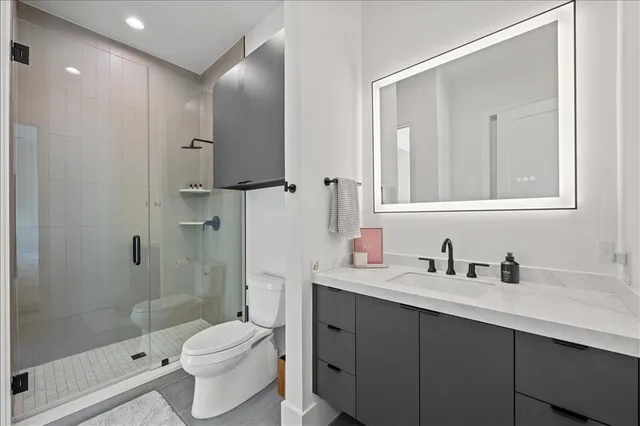 a bedroom with two beds and painted walls