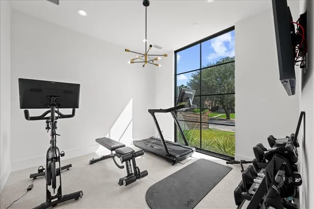 a view of a room with gym equipment