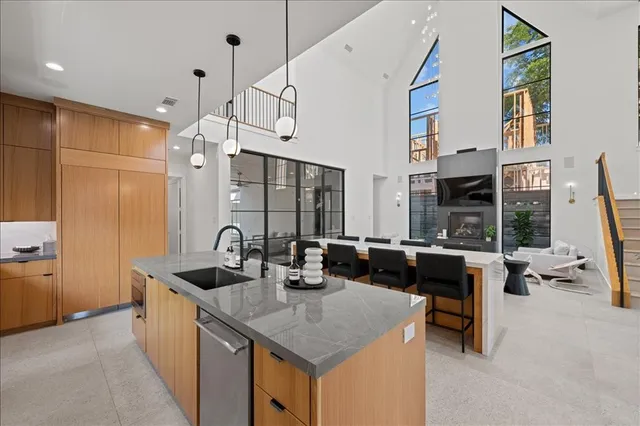 an aerial view of a house with a lake view