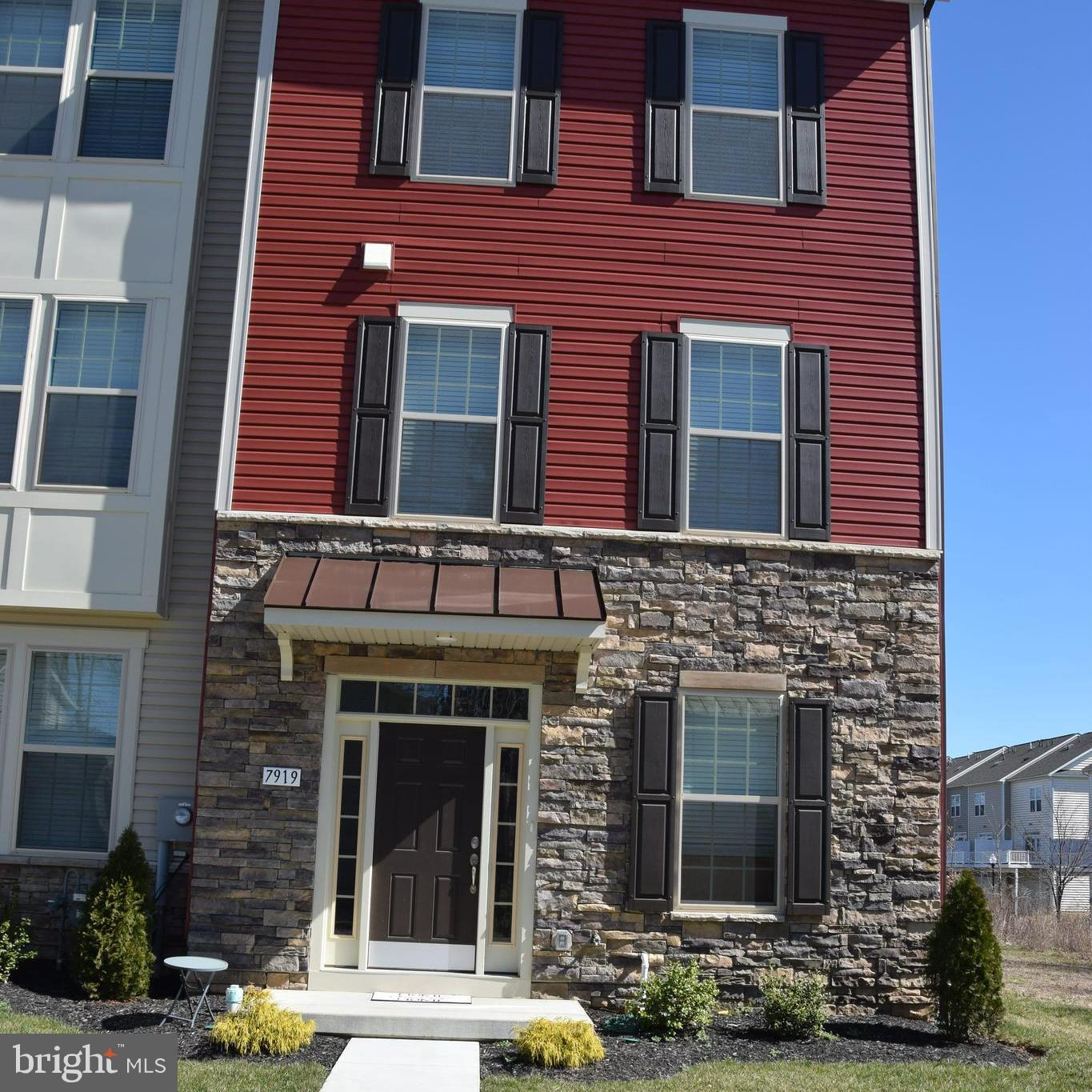 7919 Wormans Mill Road Frederick, MD 21701 - Photo 1 of 23 a front view of a building with glass windows