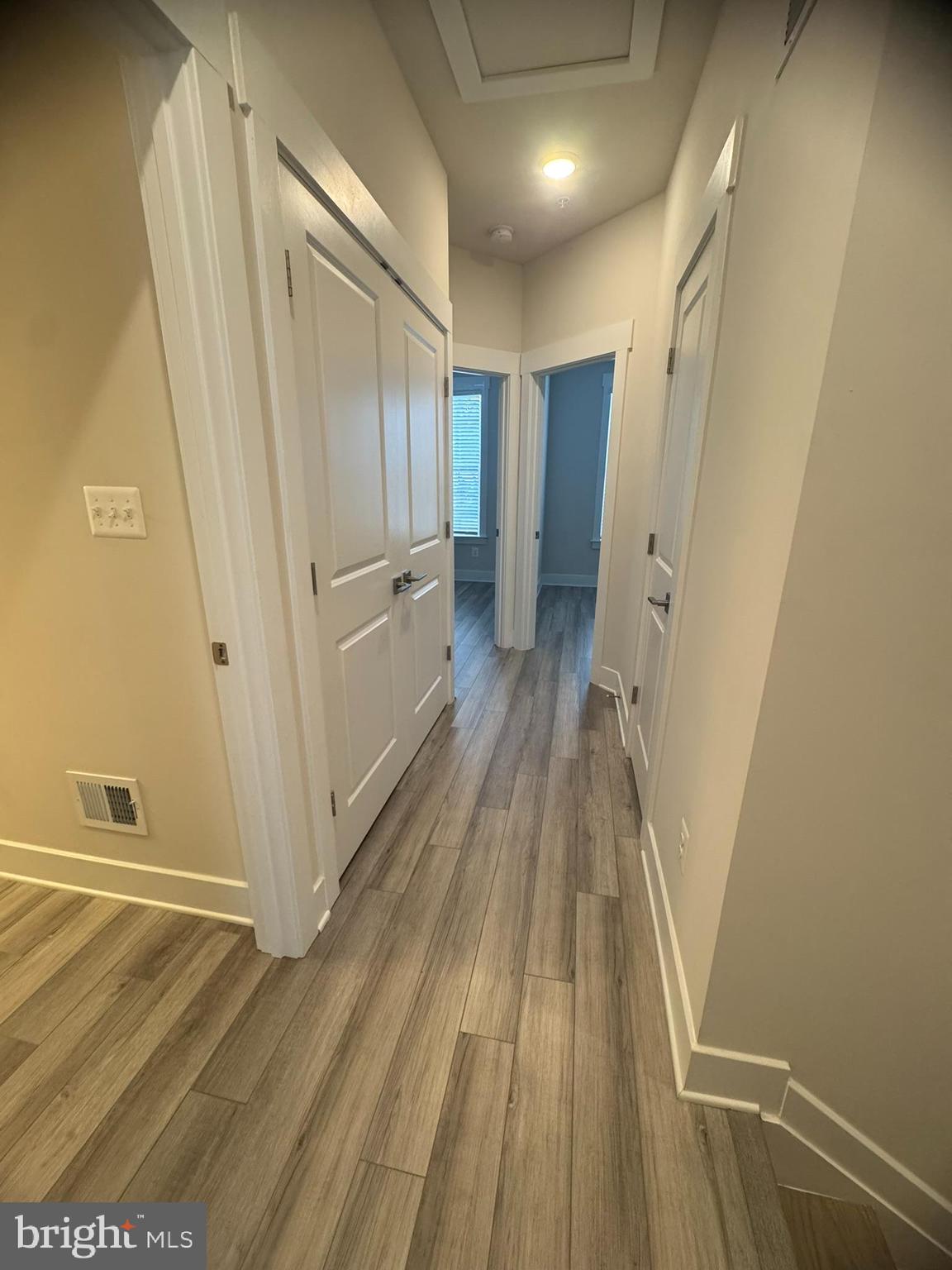 7919 Wormans Mill Road Frederick, MD 21701 - Photo 11 of 23 a view of a hallway with wooden floor