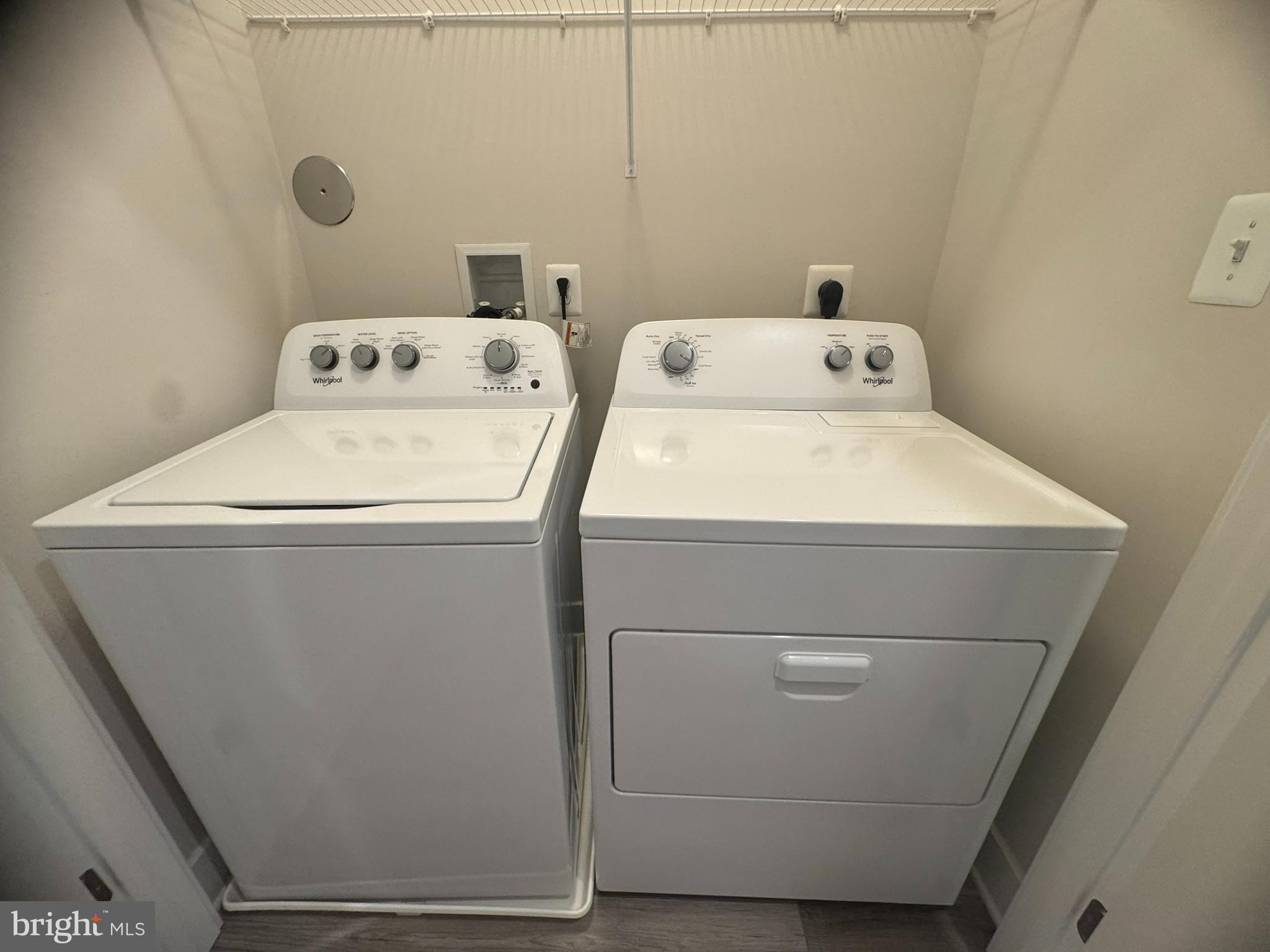 7919 Wormans Mill Road Frederick, MD 21701 - Photo 17 of 23 a utility room with dryer and washer