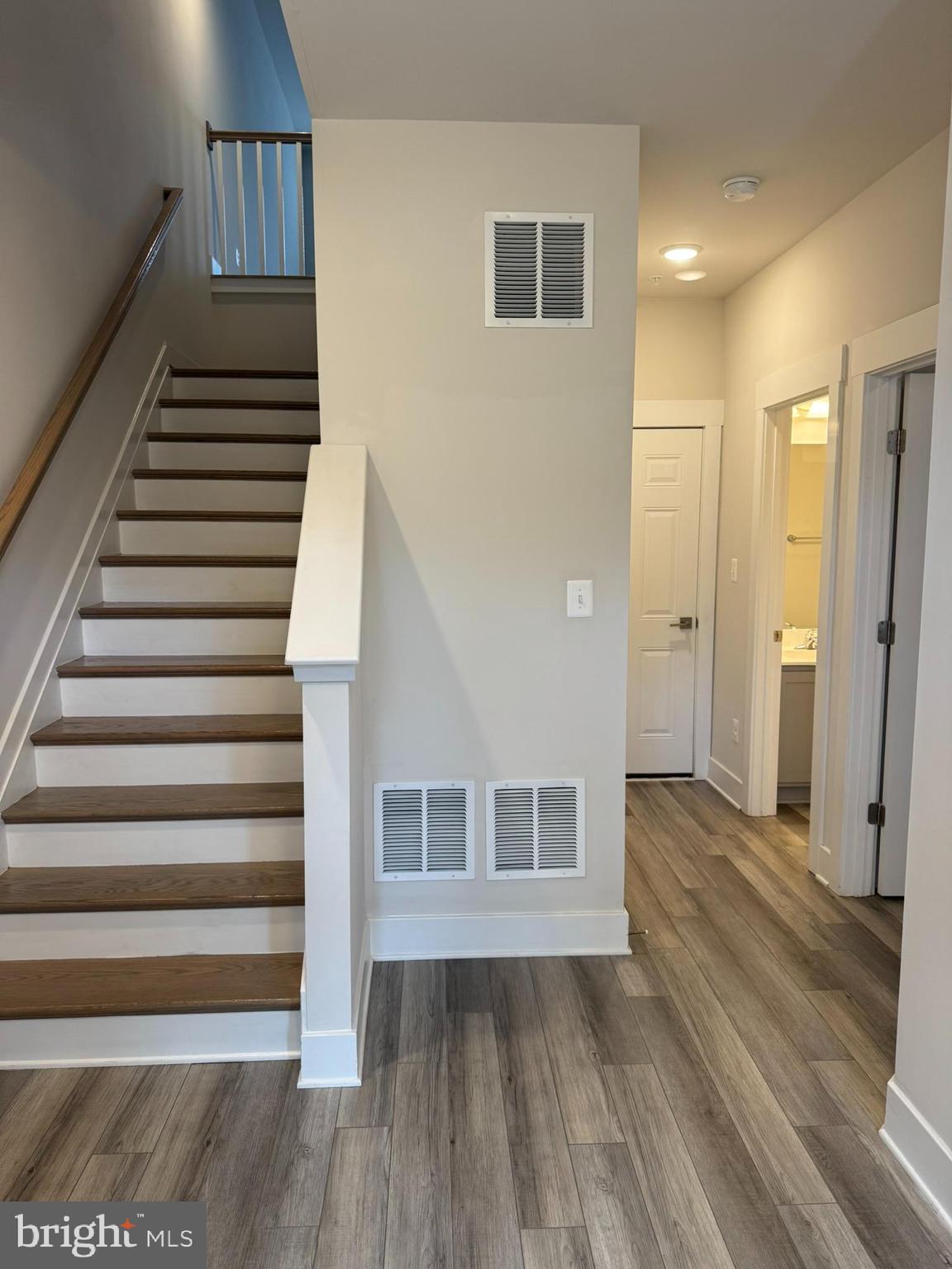 7919 Wormans Mill Road Frederick, MD 21701 - Photo 2 of 23 a view of a hallway with wooden floor and entryway
