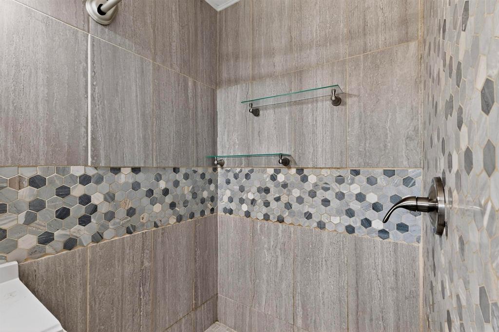 702 Rea Avenue Lancaster, TX 75146 - Photo 18 of 37 a bathroom with a shower curtain