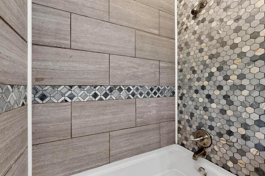 702 Rea Avenue Lancaster, TX 75146 - Photo 25 of 37 a bathroom with a shower