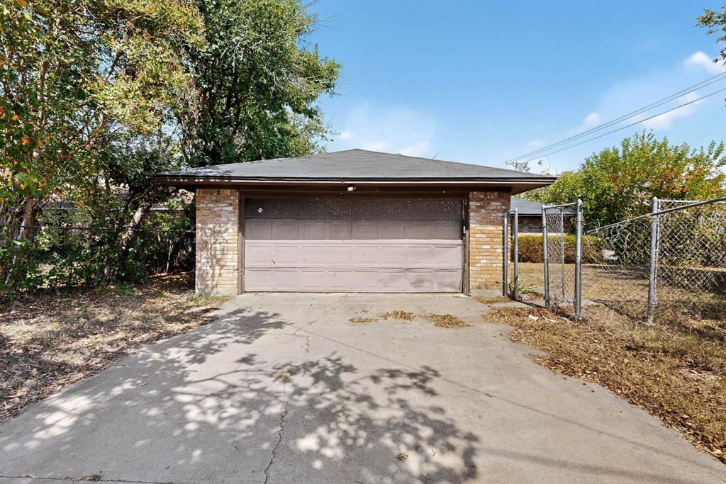 702 Rea Avenue Lancaster, TX 75146 - Photo 37 of 37 a front view of a house with a yard