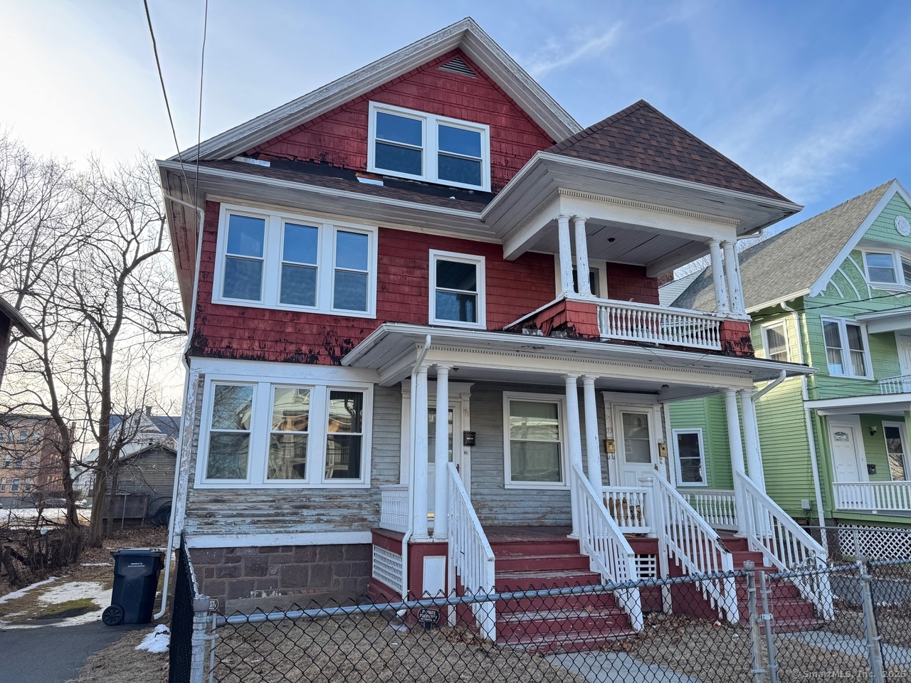 171 Edgewood Street Hartford, CT 06112 - Photo 1 of 1 a front view of a house with a yard