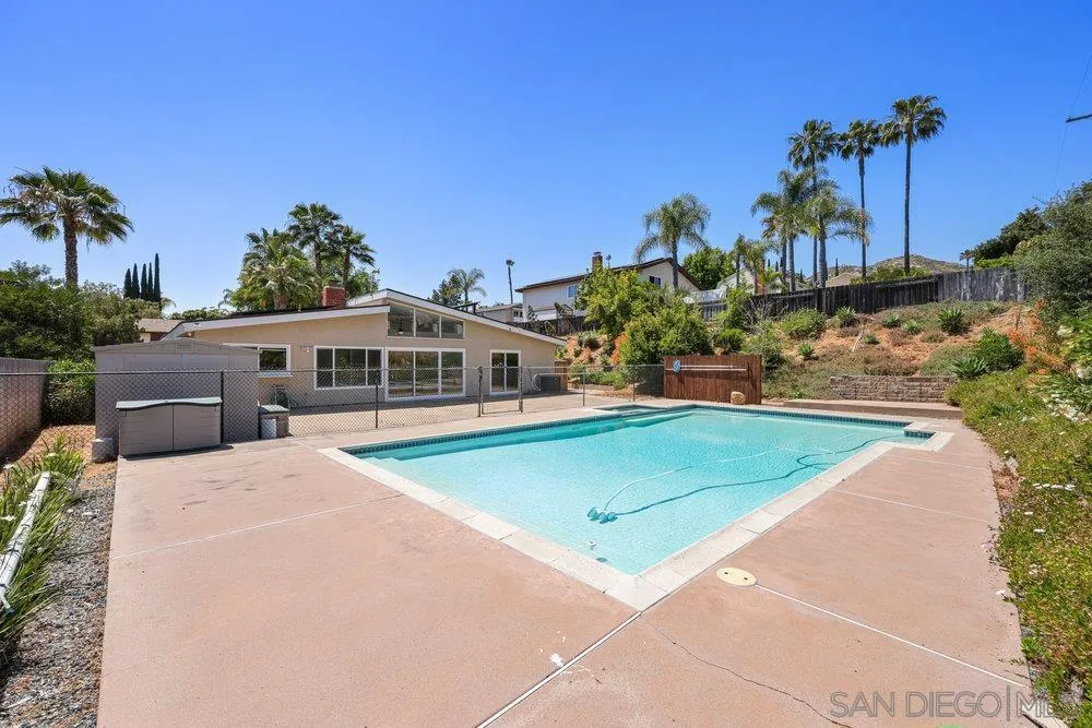 14545 Hillndale Way Poway, CA 92064 - Photo 14 of 27 a view of a house with a swimming pool