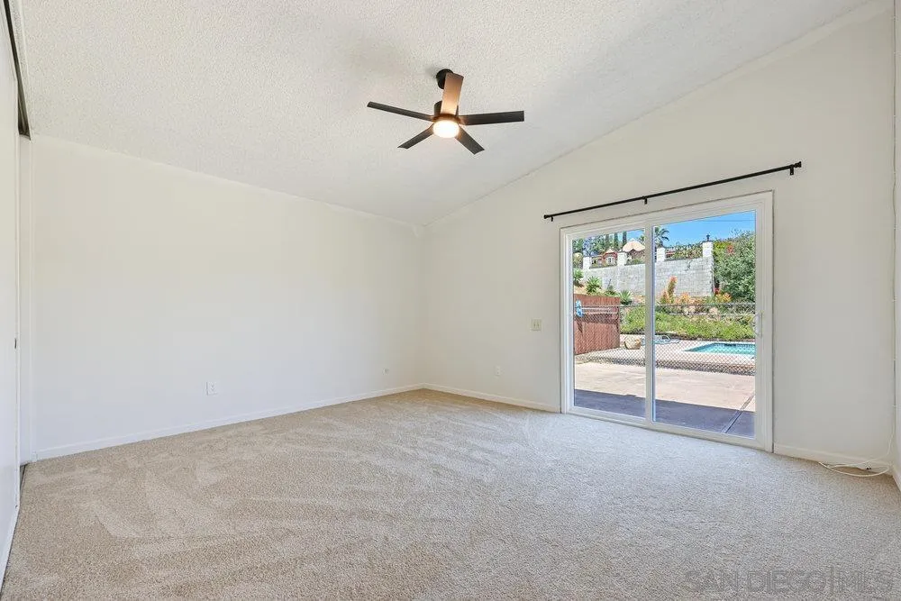 14545 Hillndale Way Poway, CA 92064 - Photo 15 of 27 a view of room with window and ceiling fan