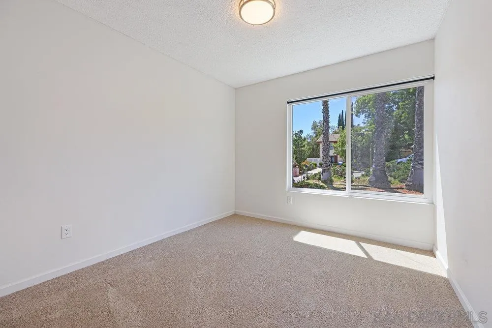 14545 Hillndale Way Poway, CA 92064 - Photo 22 of 27 a view of an empty room with a window