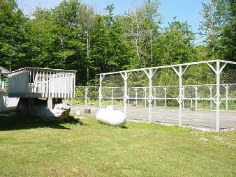 200 Dimmock Road Otis, MA 01253 - Photo 2 of 2 a view of a chair and table on the garden