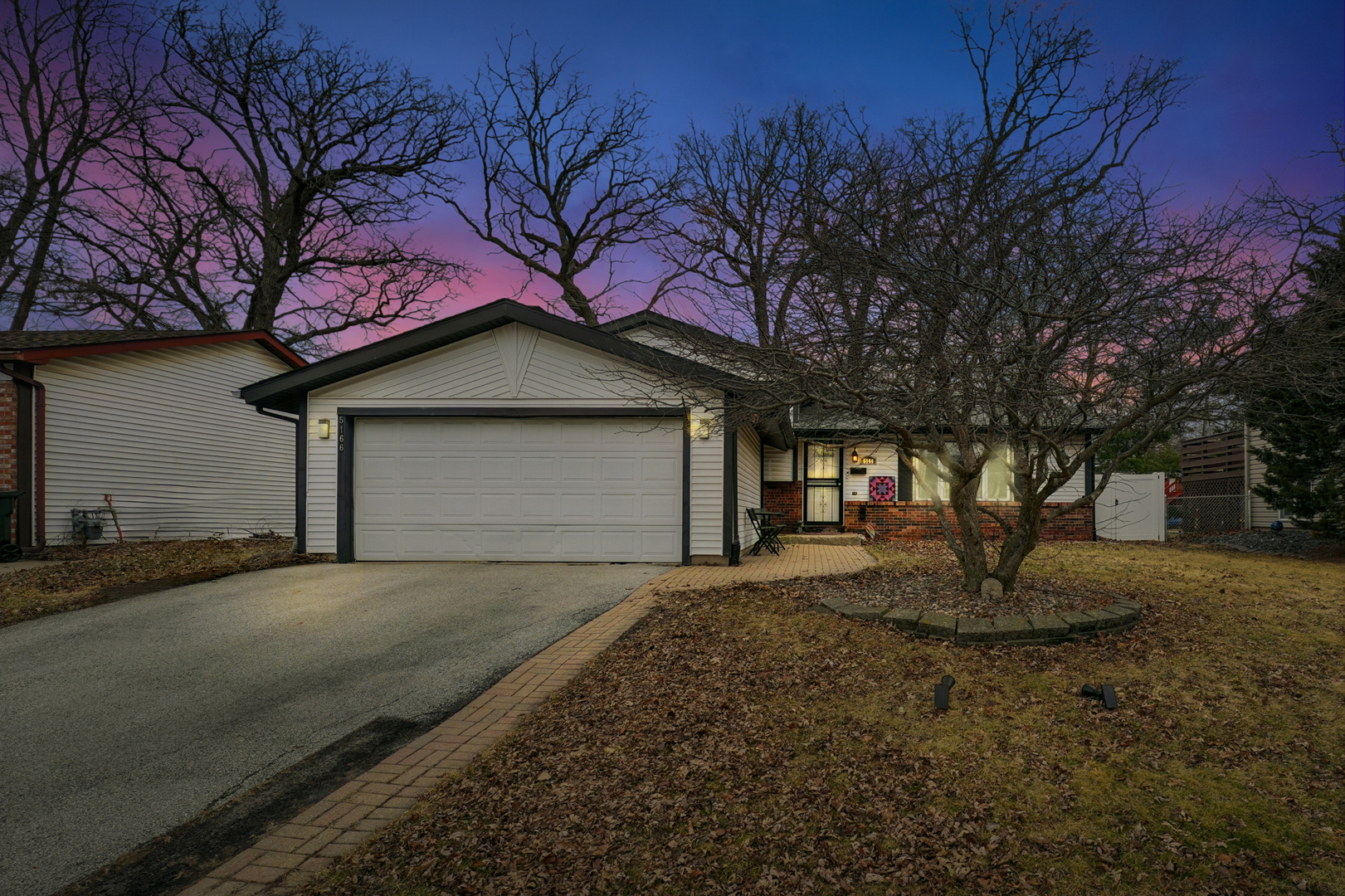 5166 Aldersyde Road Oak Forest, IL 60452 - Photo 1 of 12 a front view of a house with garden