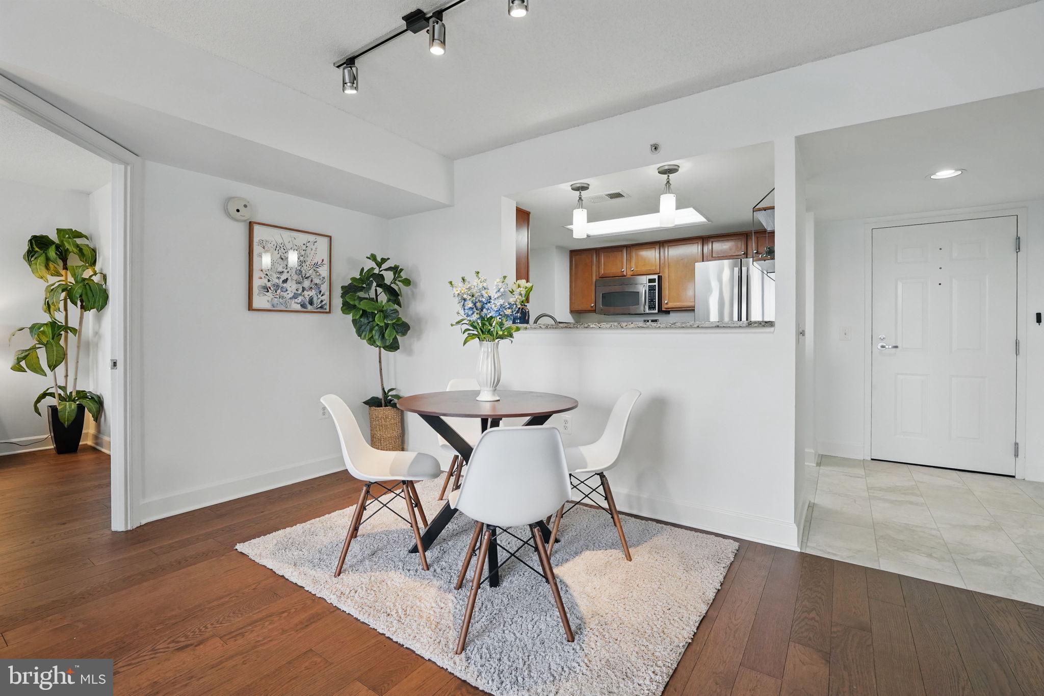 11800 Sunset Hills Road, Unit 717 Reston, VA 20190 - Photo 8 of 43 Dining with Kitchen Passthrough