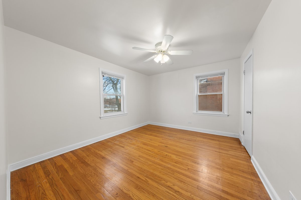 8142 South Yates Boulevard Chicago, IL 60617 - Photo 17 of 25 a view of an empty room with a window
