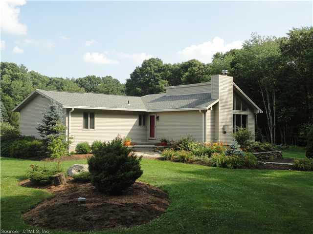 109 Clarke Road Lebanon, CT 06249 - Photo 1 of 1 a view of a house with yard and garden