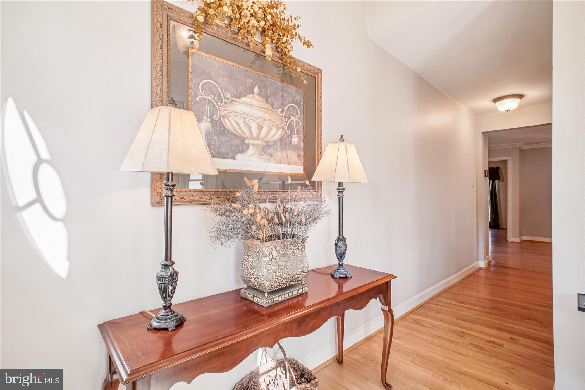 2627 Five Oaks Road Vienna, VA 22181 - Photo 12 of 111 a view of a dining room with furniture and wooden floor