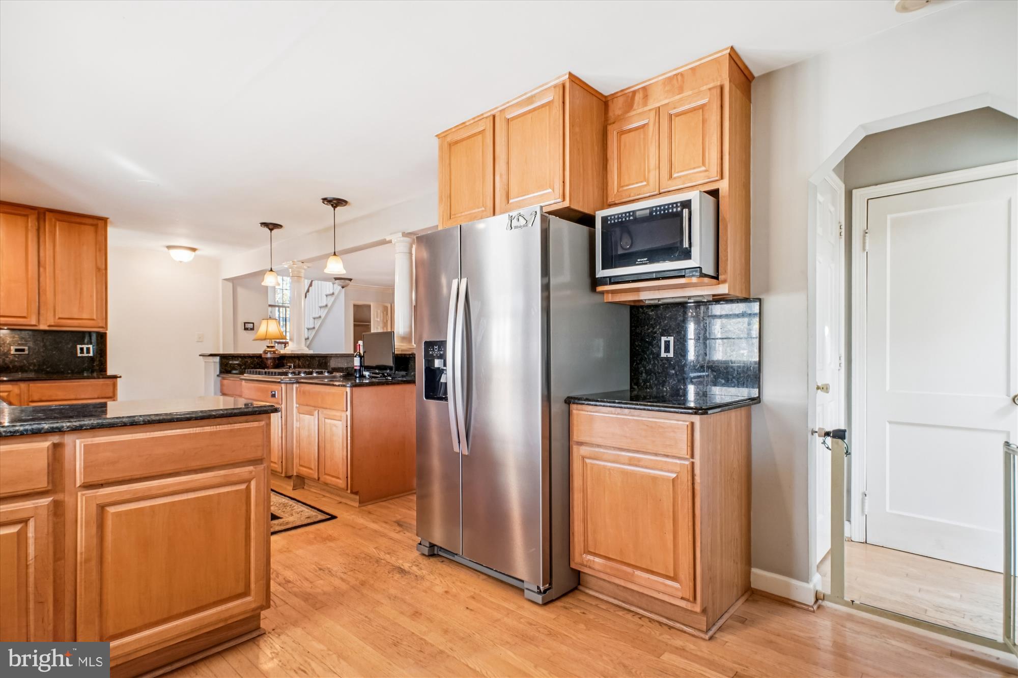 2627 Five Oaks Road Vienna, VA 22181 - Photo 22 of 111 a kitchen with stainless steel appliances a refrigerator stove and microwave