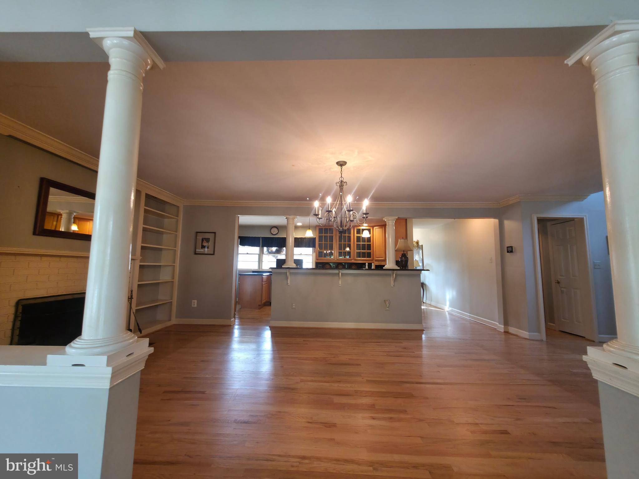 2627 Five Oaks Road Vienna, VA 22181 - Photo 32 of 111 a view of a living room kitchen and a flat screen tv