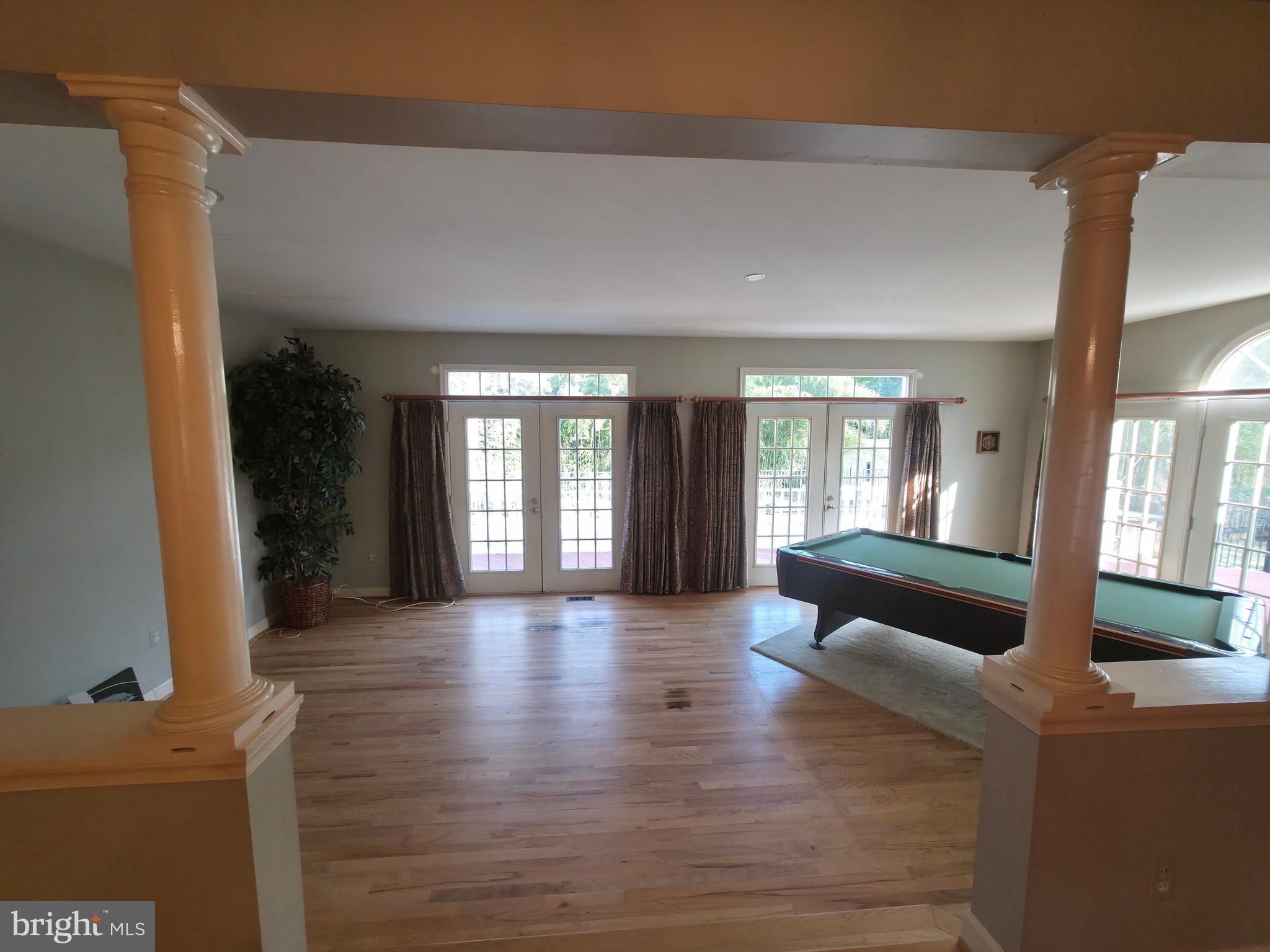 2627 Five Oaks Road Vienna, VA 22181 - Photo 35 of 111 a living room with furniture and a large window
