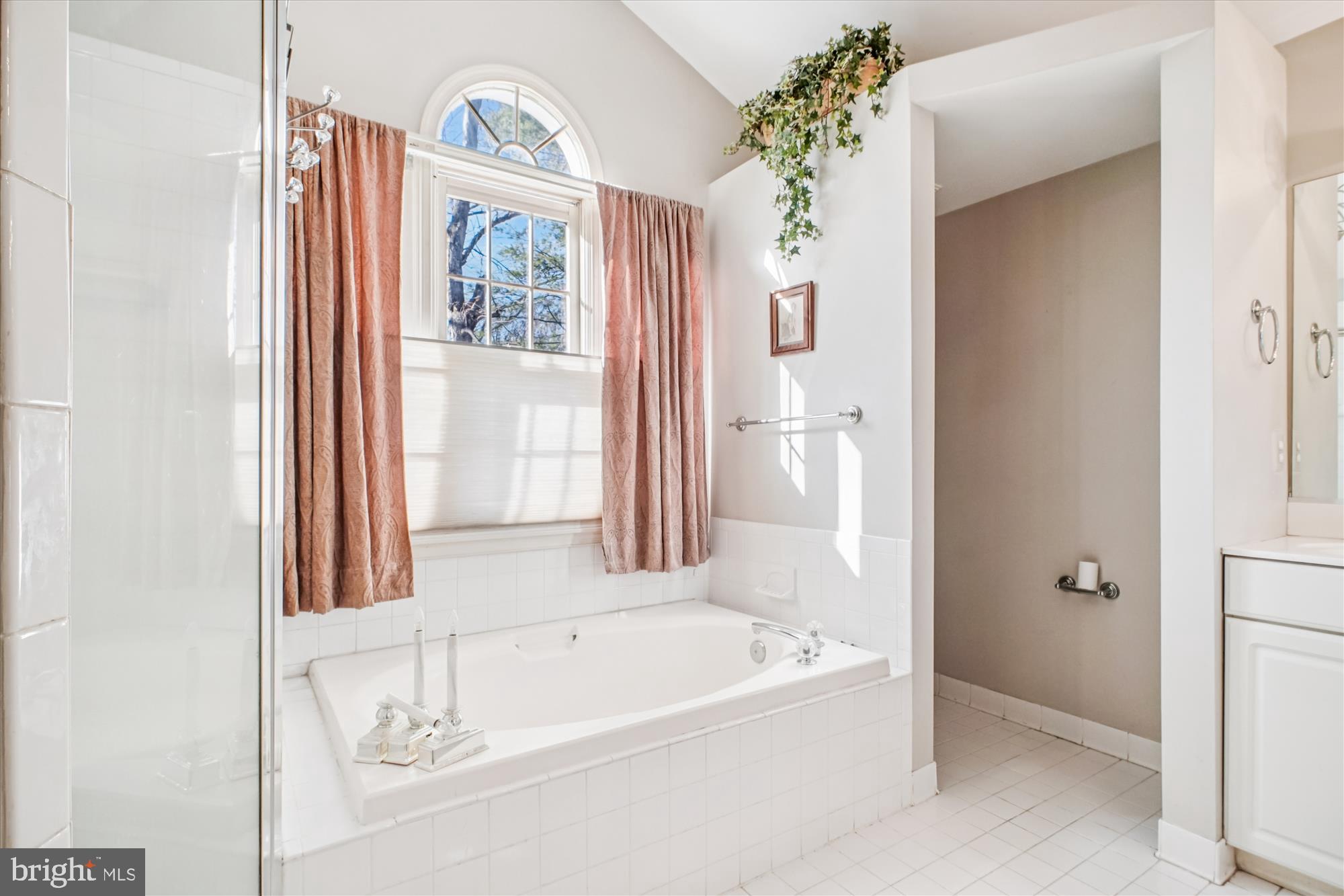 2627 Five Oaks Road Vienna, VA 22181 - Photo 48 of 111 a bath room with a bath tub and a shower