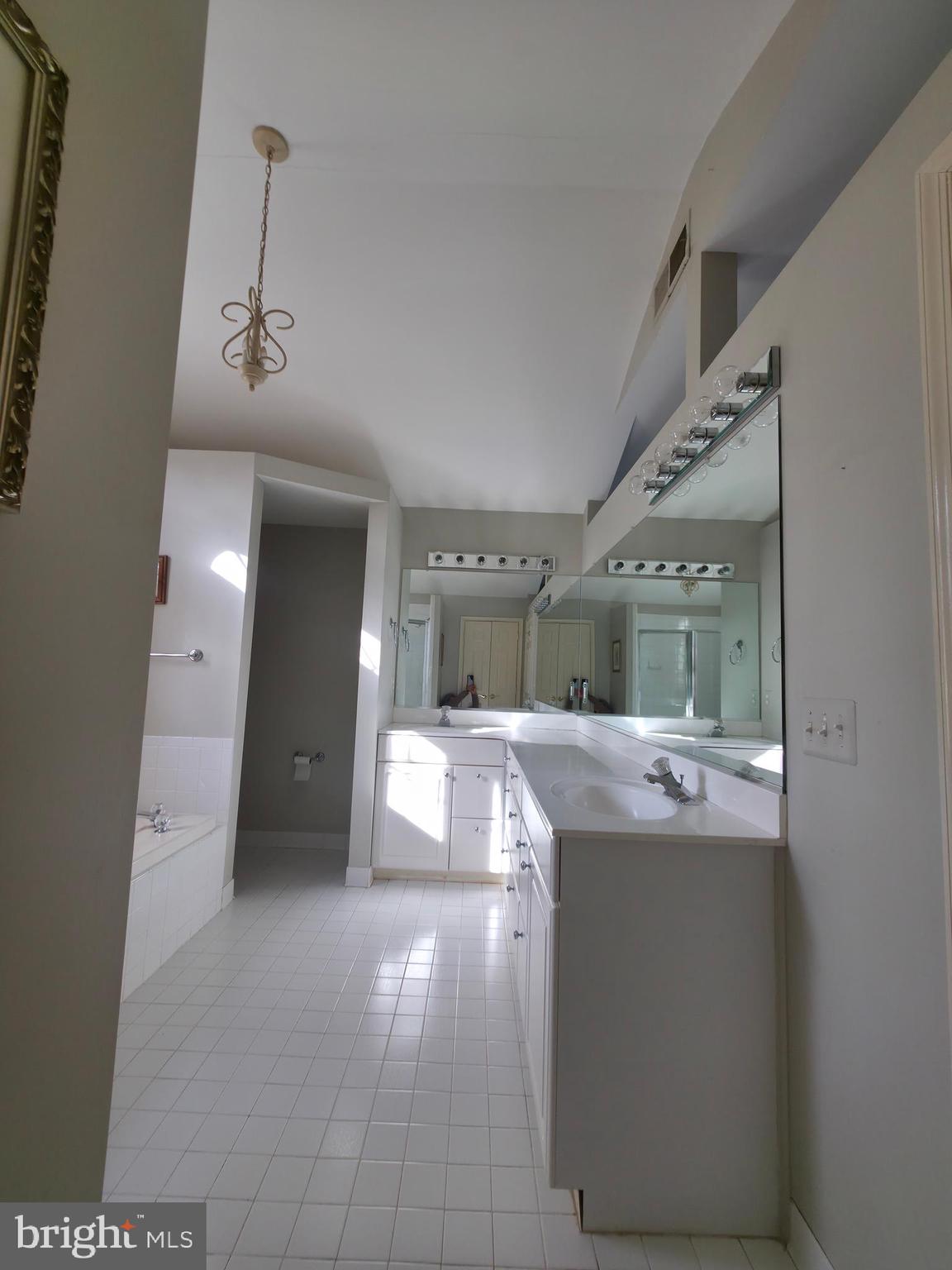 2627 Five Oaks Road Vienna, VA 22181 - Photo 60 of 111 a view of living room with granite countertop furniture and fireplace