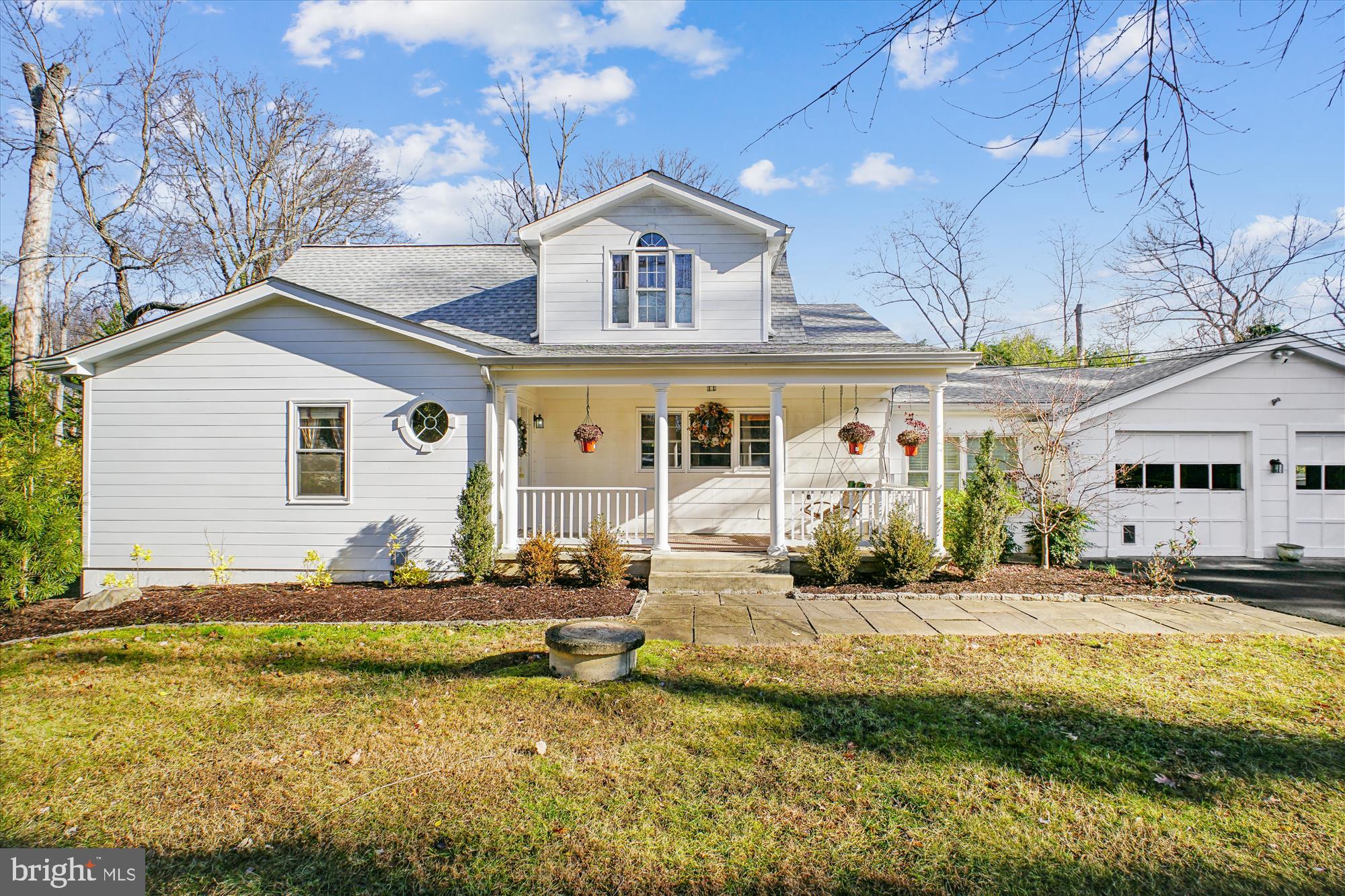 2627 Five Oaks Road Vienna, VA 22181 - Photo 7 of 111 a front view of a house with swimming pool and sitting area
