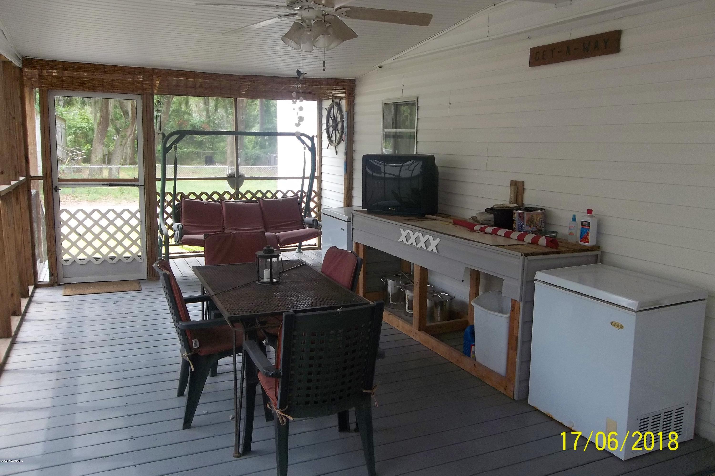 4 Triangle Road St. Helena Island, SC 29920 - Photo 9 of 14 Screen Porch