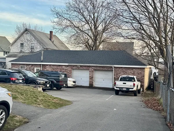 a car parked in front of a house