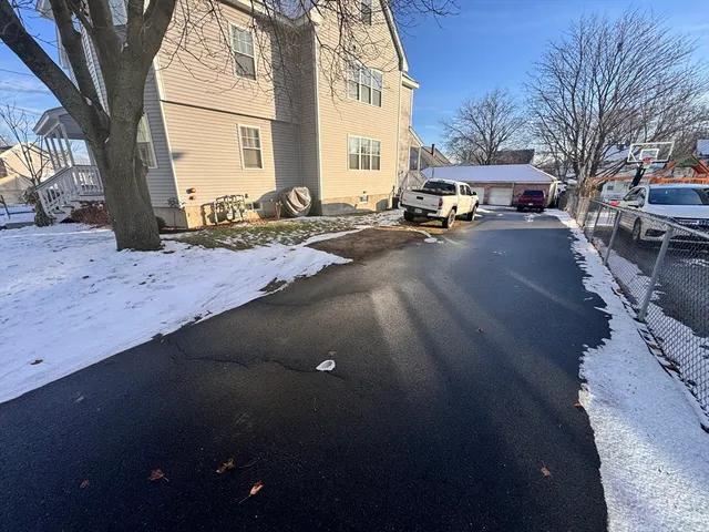 a cars parked on the side of street