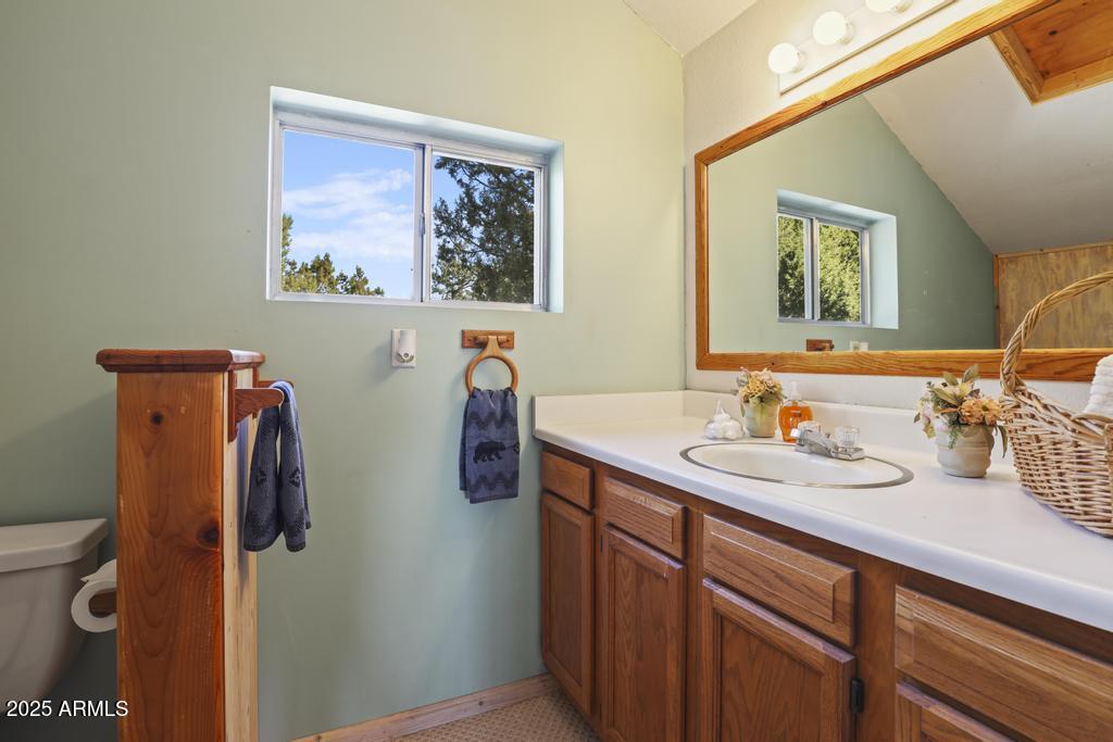 7984 Vista Del Norte Payson, AZ 85541 - Photo 17 of 21 a bathroom with a sink and mirror with toilet