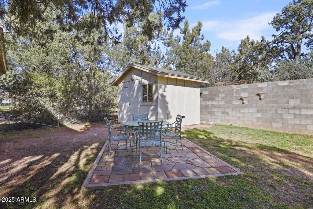 7984 Vista Del Norte Payson, AZ 85541 - Photo 19 of 21 a view of a chair and table on the wooden floor
