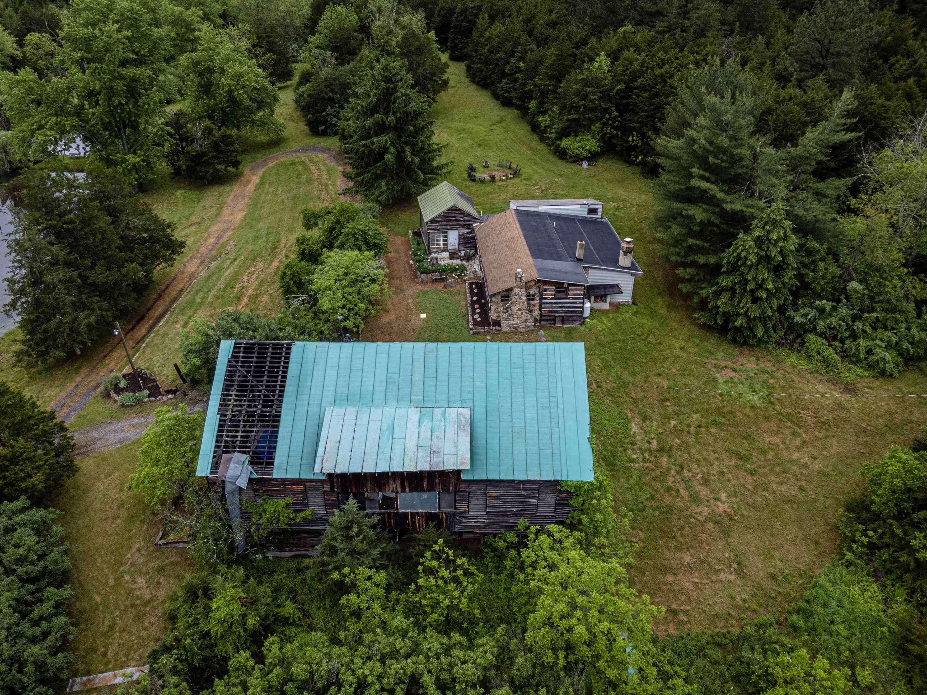 9881 Fort Valley Road Fort Valley, VA 22652 - Photo 66 of 75 an aerial view of a house with a yard and lake view