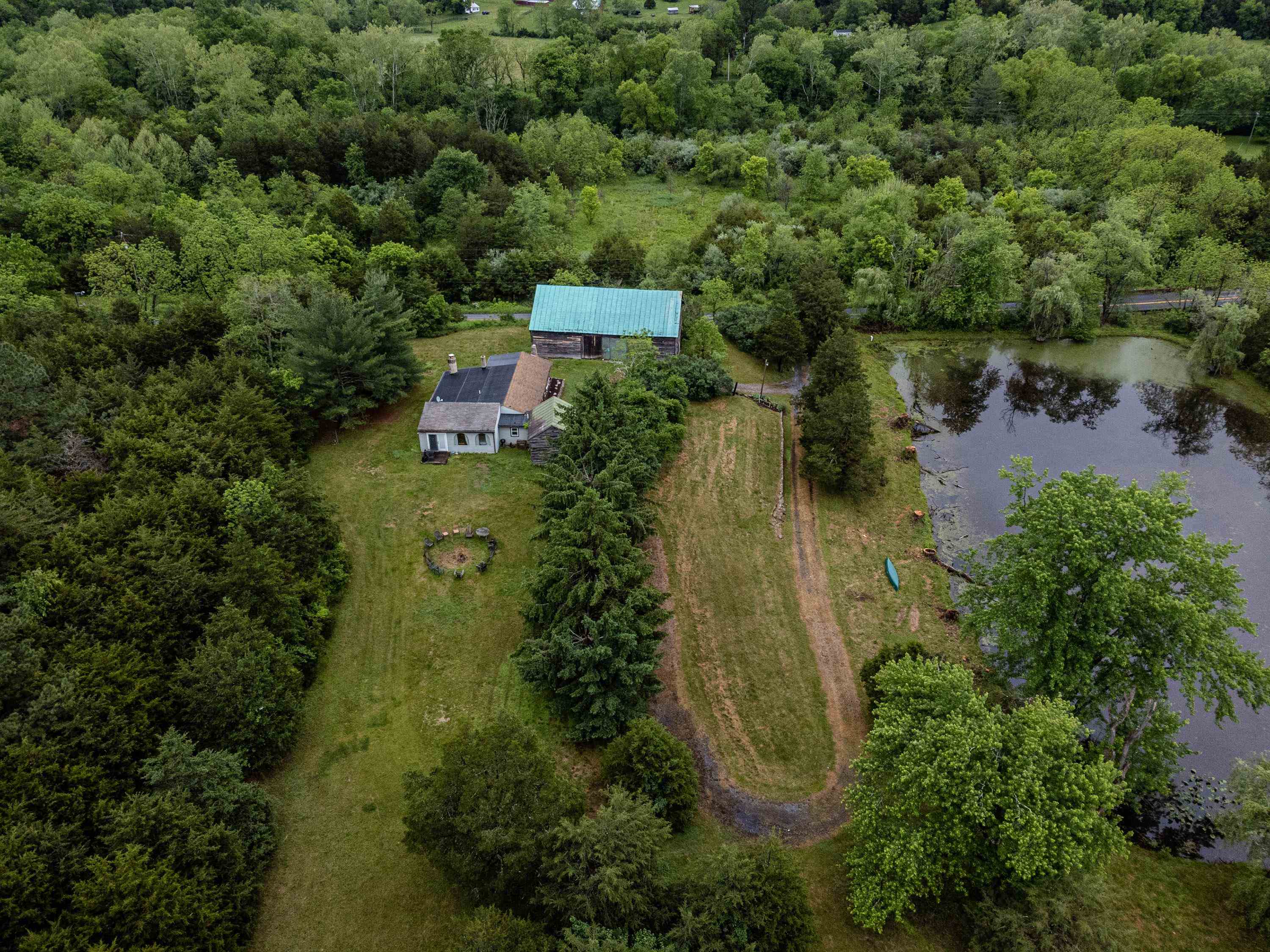 9881 Fort Valley Road Fort Valley, VA 22652 - Photo 68 of 75 an aerial view of a house with outdoor space and trees all around