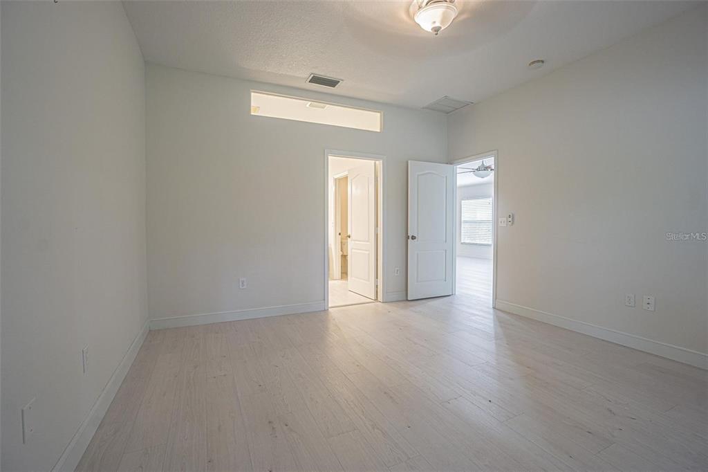 31912 Turkeyhill Drive Wesley Chapel, FL 33543 - Photo 11 of 27 a view of an empty room and window