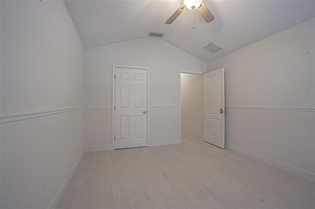 31912 Turkeyhill Drive Wesley Chapel, FL 33543 - Photo 15 of 27 wooden floor in an empty room