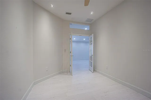 a view of an empty room and window