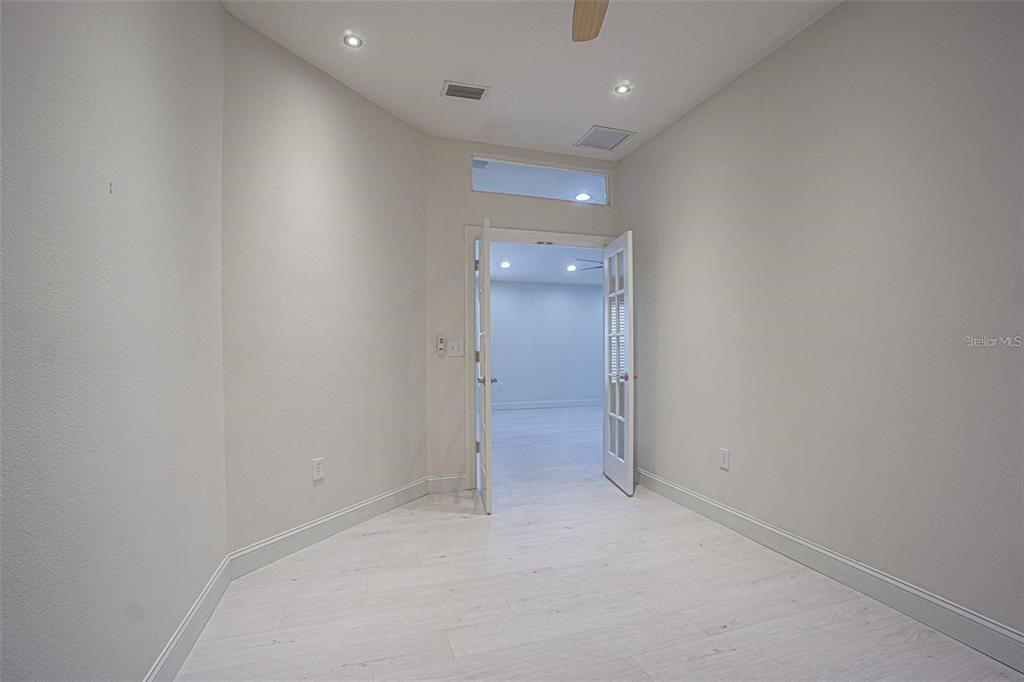 31912 Turkeyhill Drive Wesley Chapel, FL 33543 - Photo 10 of 27 wooden floor in an empty room