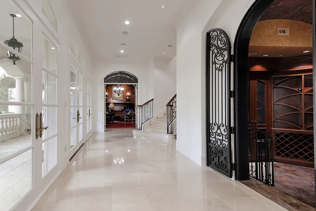 a view of a hallway view with staircase