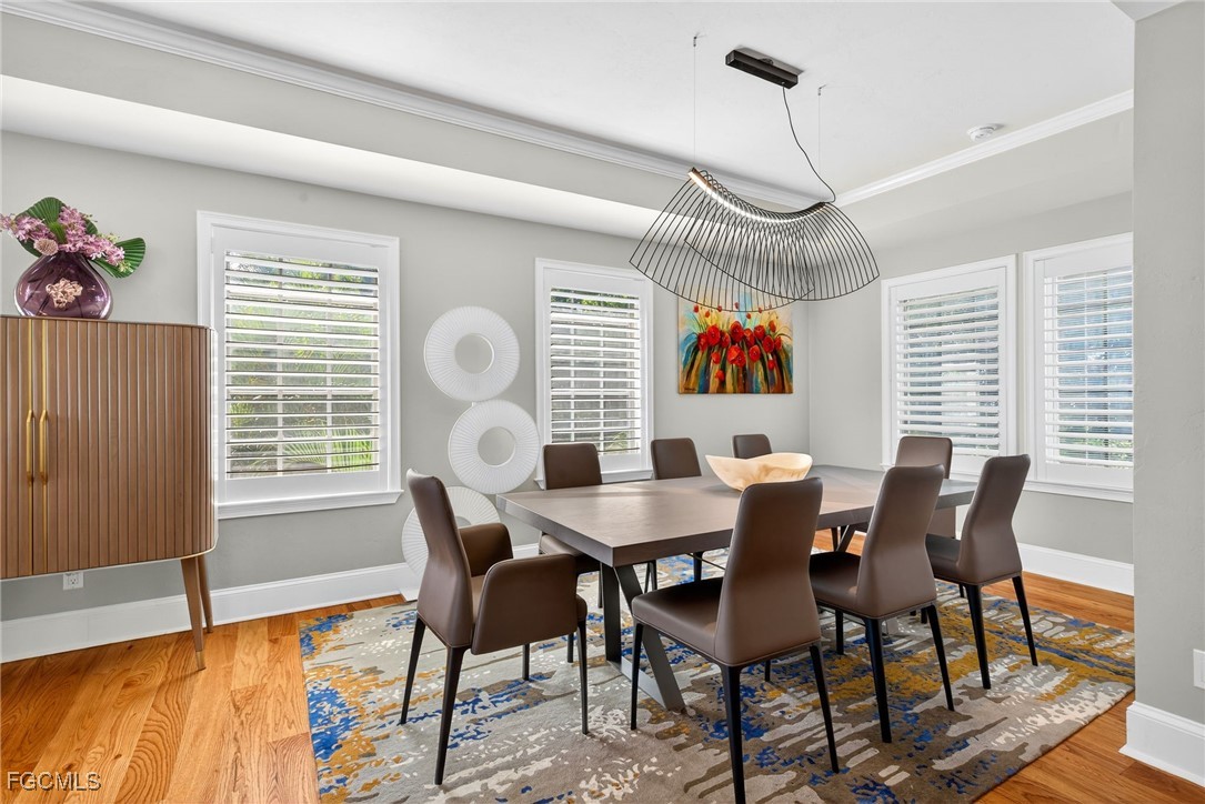 323 Useppa Island Bokeelia, FL 33922 - Photo 11 of 36 a dining room with furniture and window