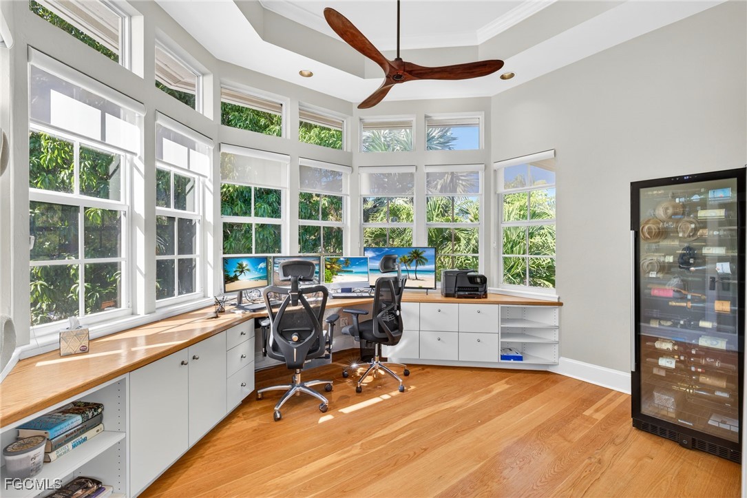 323 Useppa Island Bokeelia, FL 33922 - Photo 26 of 36 a view of a room with gym equipment and a large window