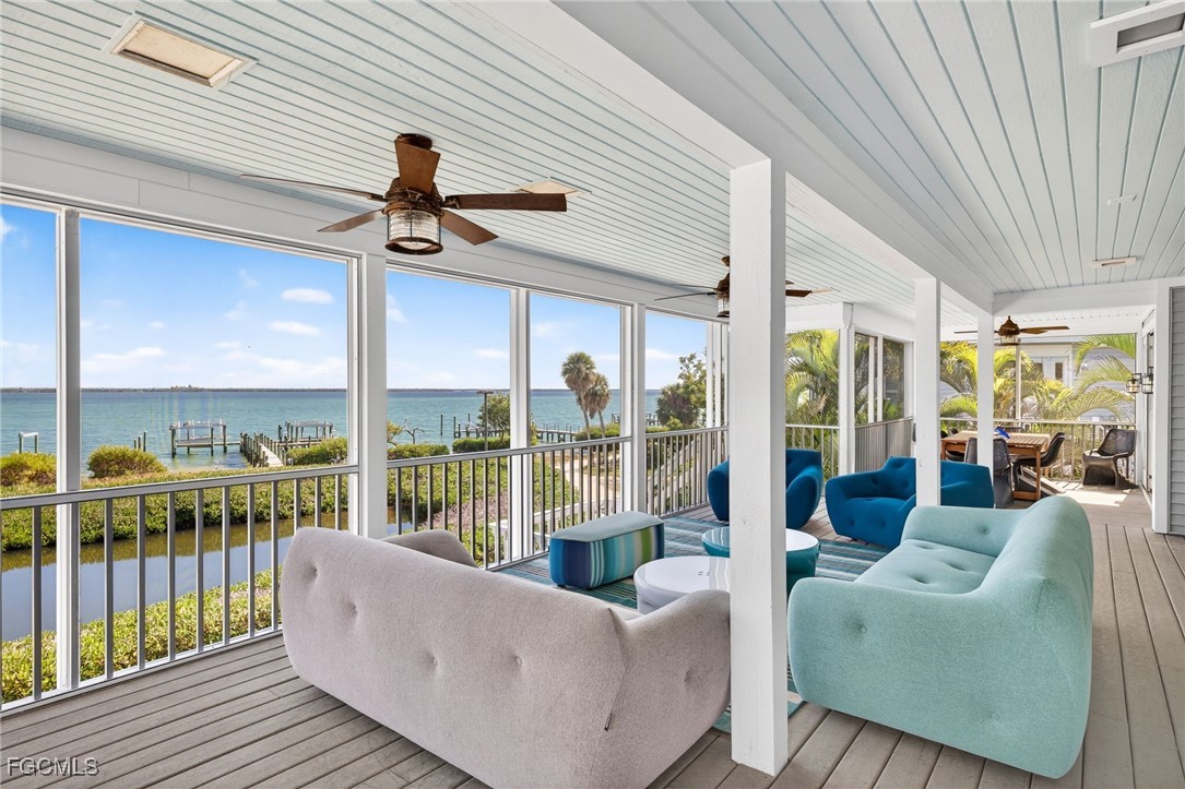 323 Useppa Island Bokeelia, FL 33922 - Photo 4 of 36 a living room with furniture