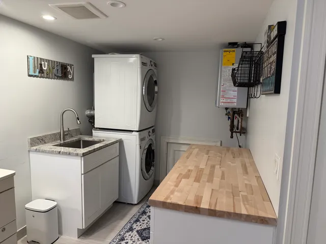 a kitchen with a stove and a refrigerator