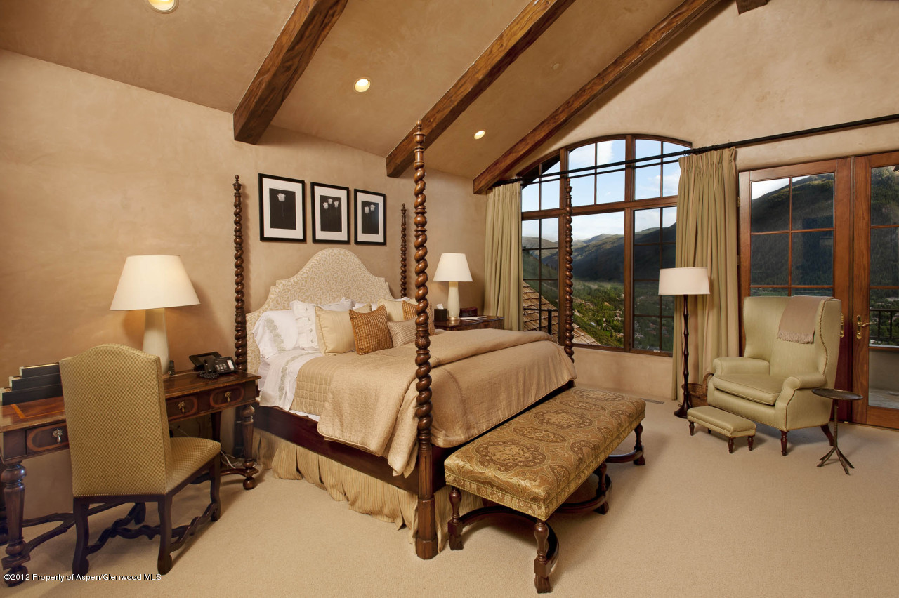 639 Hunter Creek Road Aspen, CO 81611 - Photo 6 of 13 a bedroom with furniture and a large window