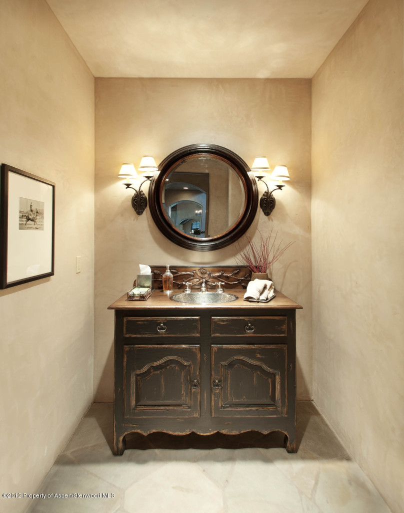 639 Hunter Creek Road Aspen, CO 81611 - Photo 9 of 13 a stove top oven sitting inside of a kitchen
