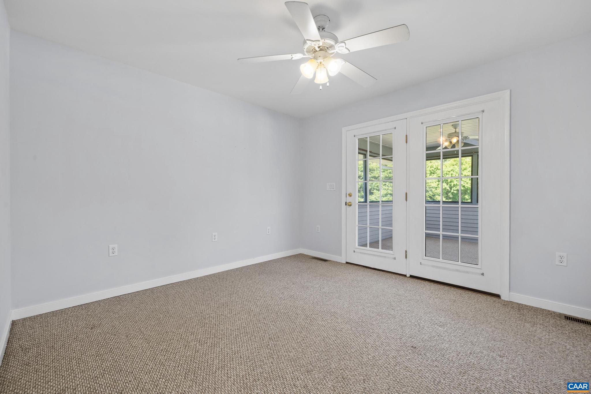 1075 Social Hall Road New Canton, VA 23123 - Photo 4 of 64 an empty room with chandelier fan
