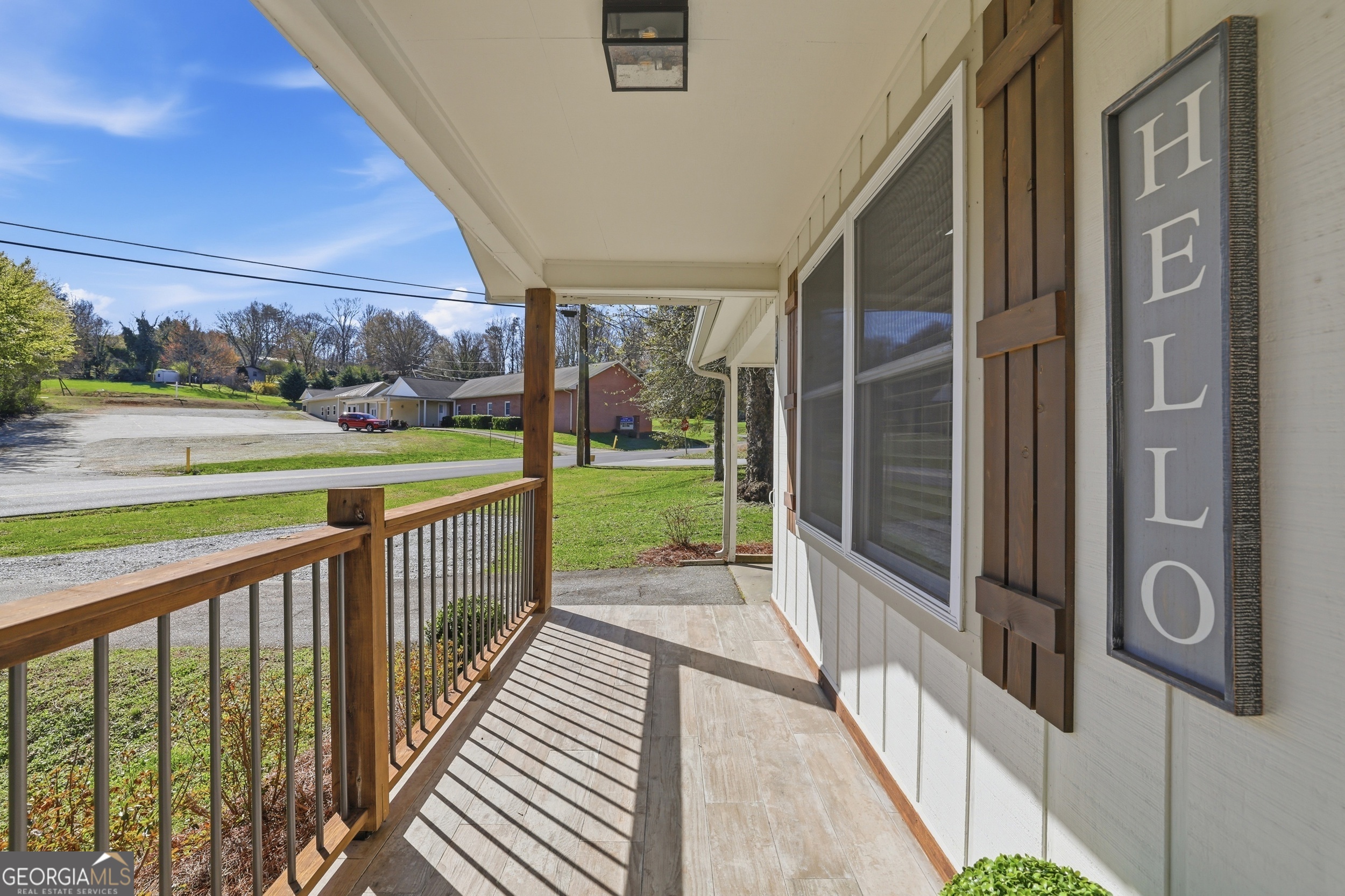 232 Stekoa Falls Road Clayton, GA 30525 - Photo 3 of 24 a view of a pathway of a building from a balcony