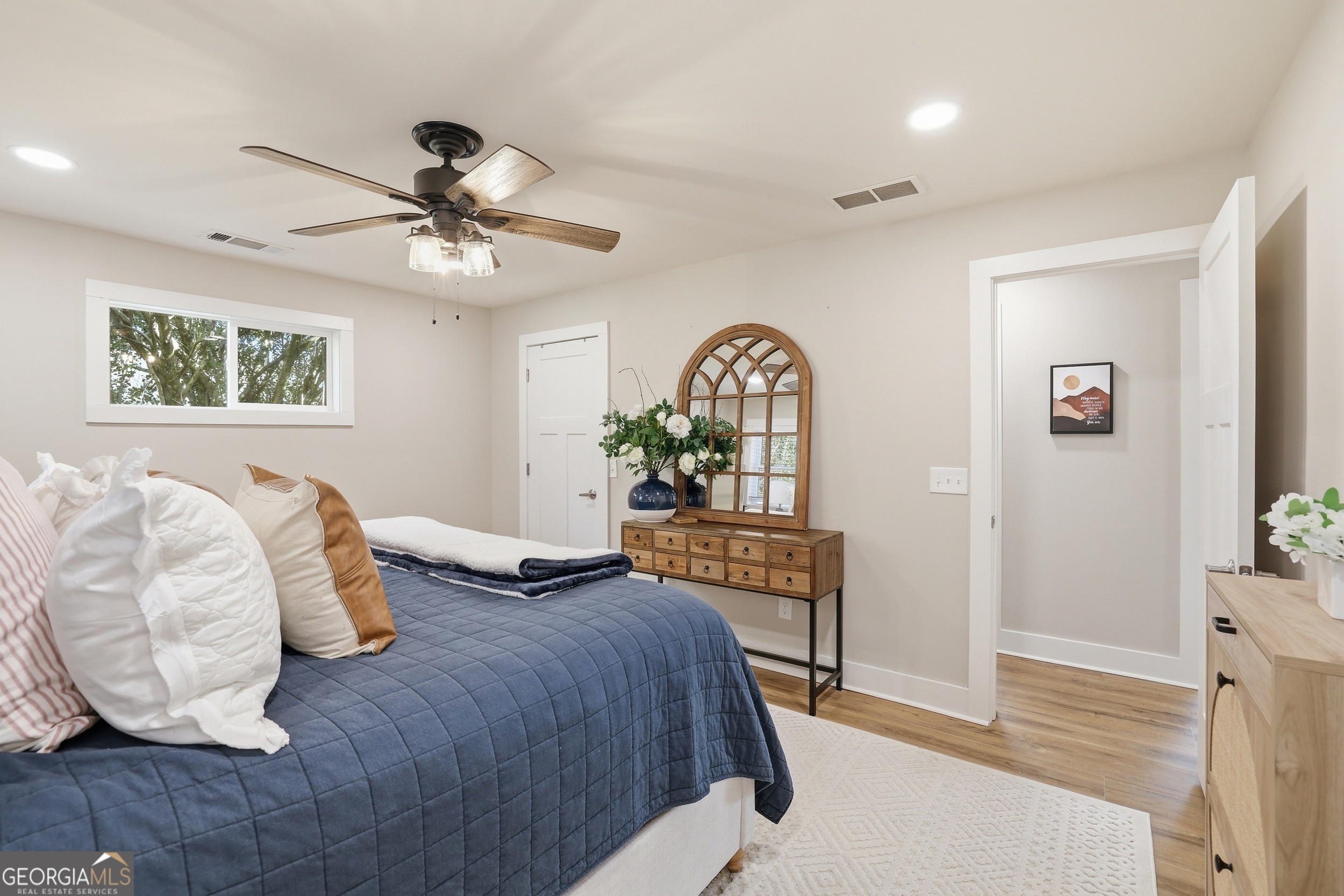 232 Stekoa Falls Road Clayton, GA 30525 - Photo 10 of 24 a bedroom with a bed and wooden floor