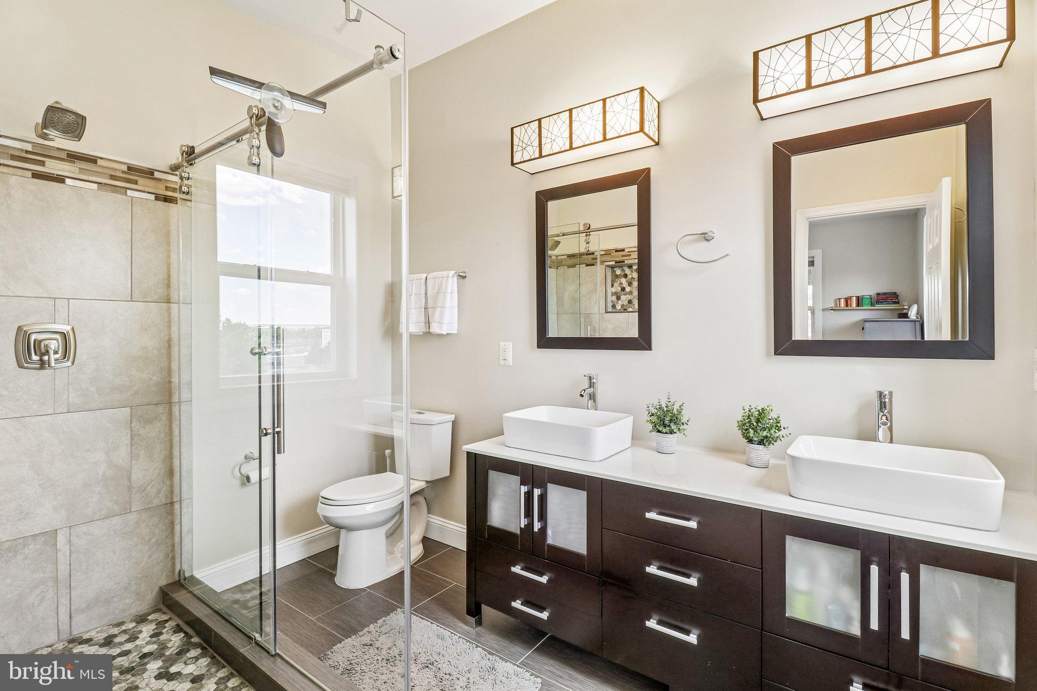 233 S Street Northeast, Unit 5 Washington, DC 20002 - Photo 3 of 41 Sleek modern bathroom oasis.