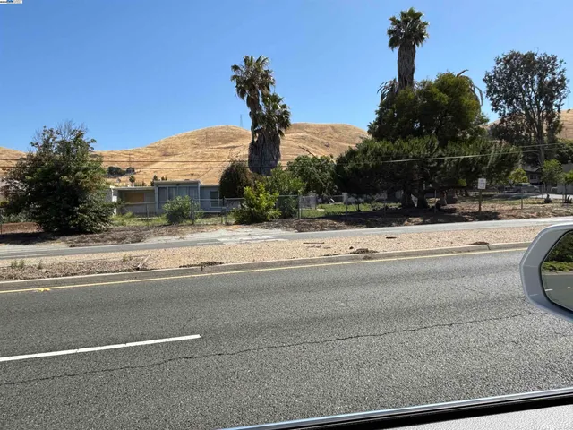 a view of street with a house